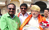 Prahlad Modi makes a stopover in Mysuru